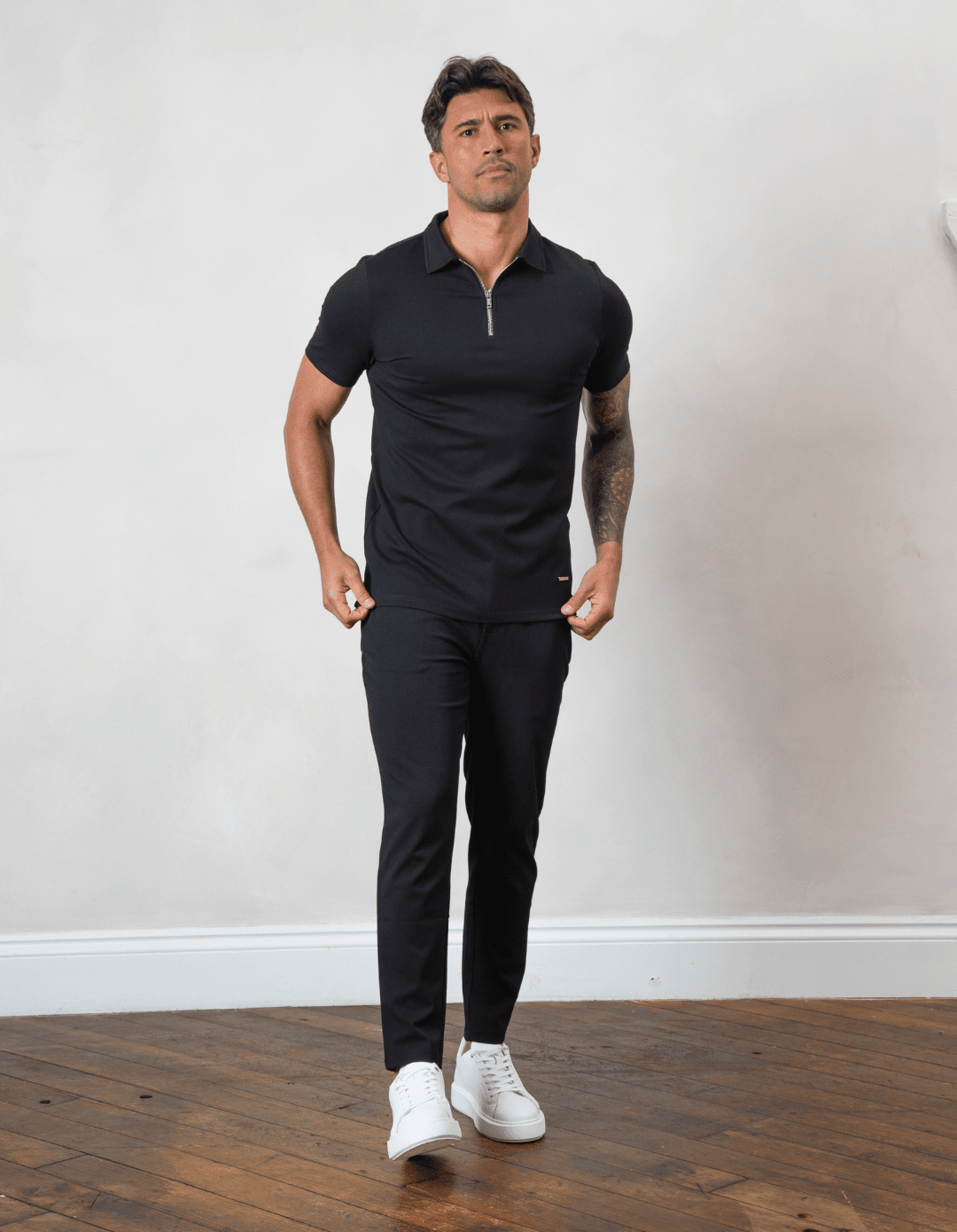 Polo shirt and black pants sales